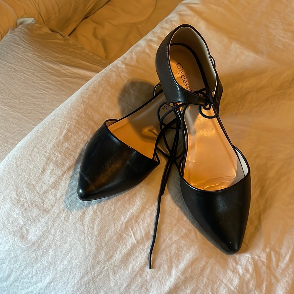 Black size 9 cityclassified . New without tag. In perfect condition. Never worn